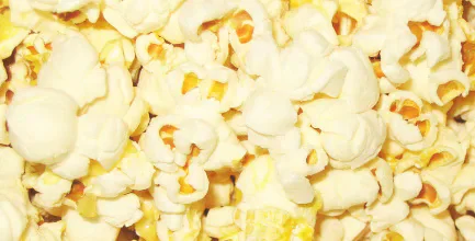 A close-up view of popped popcorn.