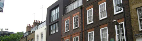 A row of multi-storey urban houses