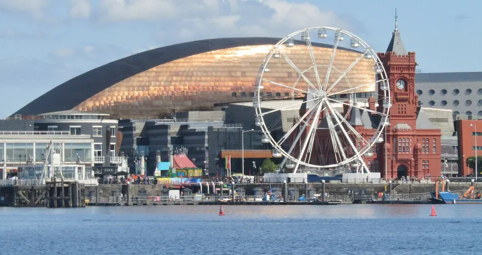 Cardiff Bay waterfront with the Wales Millennium Centre, Pierhead Building and a ferris wheel