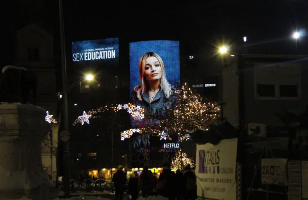 Night-time street display advertising Sex Education on Netflix