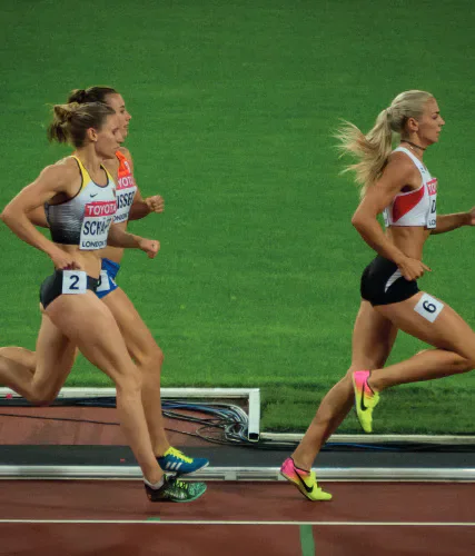 Women competing in a track race