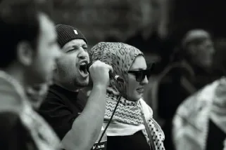 Protesters chanting in a crowd