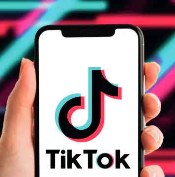 TikTok logo displayed on a smartphone