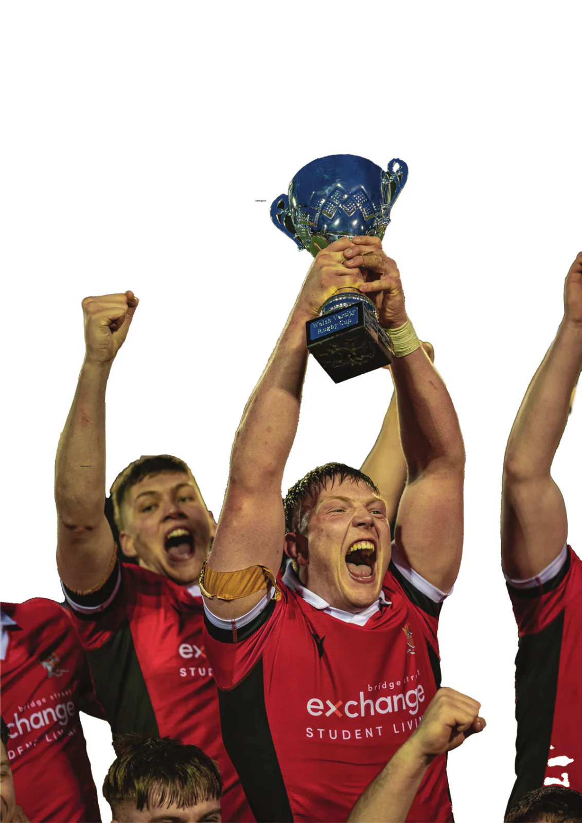 Cardiff Varsity rugby players celebrating with the Welsh Varsity Rugby Cup.