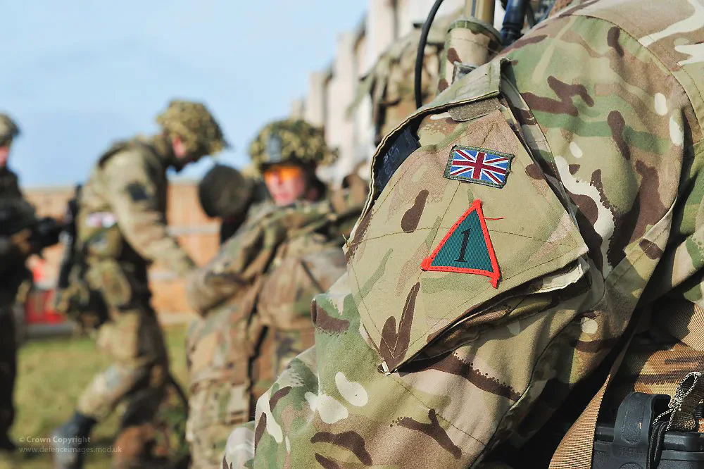 British Army personnel in camouflage uniform during an exercise.