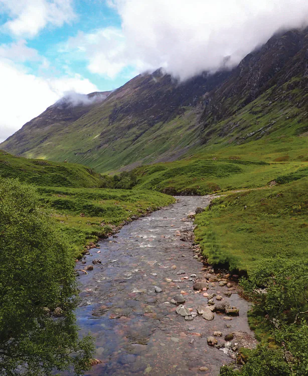 A mountain valley and stream in the Scottish Highlands.