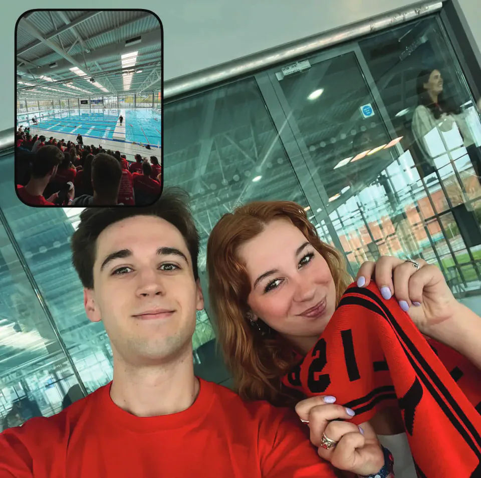 Two spectators in Cardiff red with an inset photograph of a swimming pool