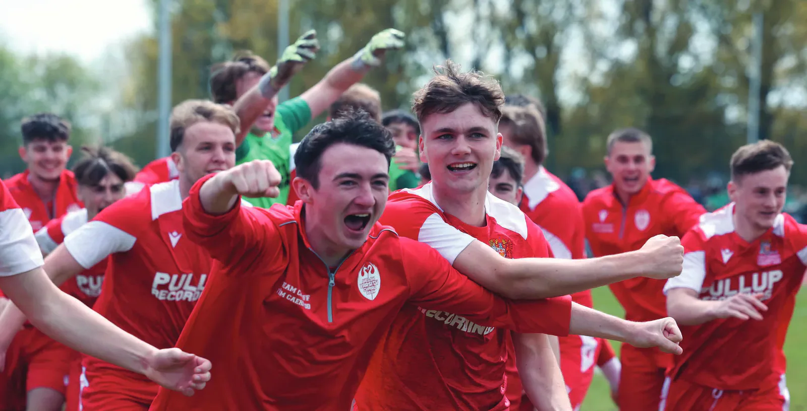 Cardiff football players celebrating