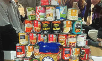 Expression Dance food bank collection arranged in a pyramid