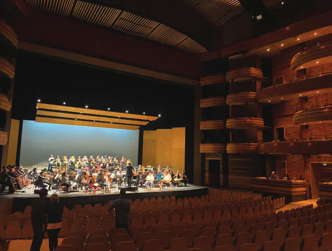 The Welsh National Opera orchestra on stage in the Wales Millennium Centre
