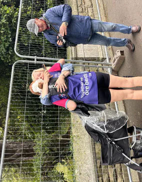 Sophie Pask hugging a supporter after the race.