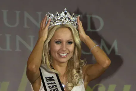The 2011 Miss Galaxy Wales winner wearing her crown and sash.