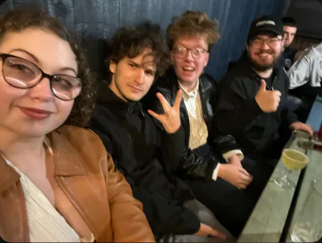 Group selfie of student media members.
