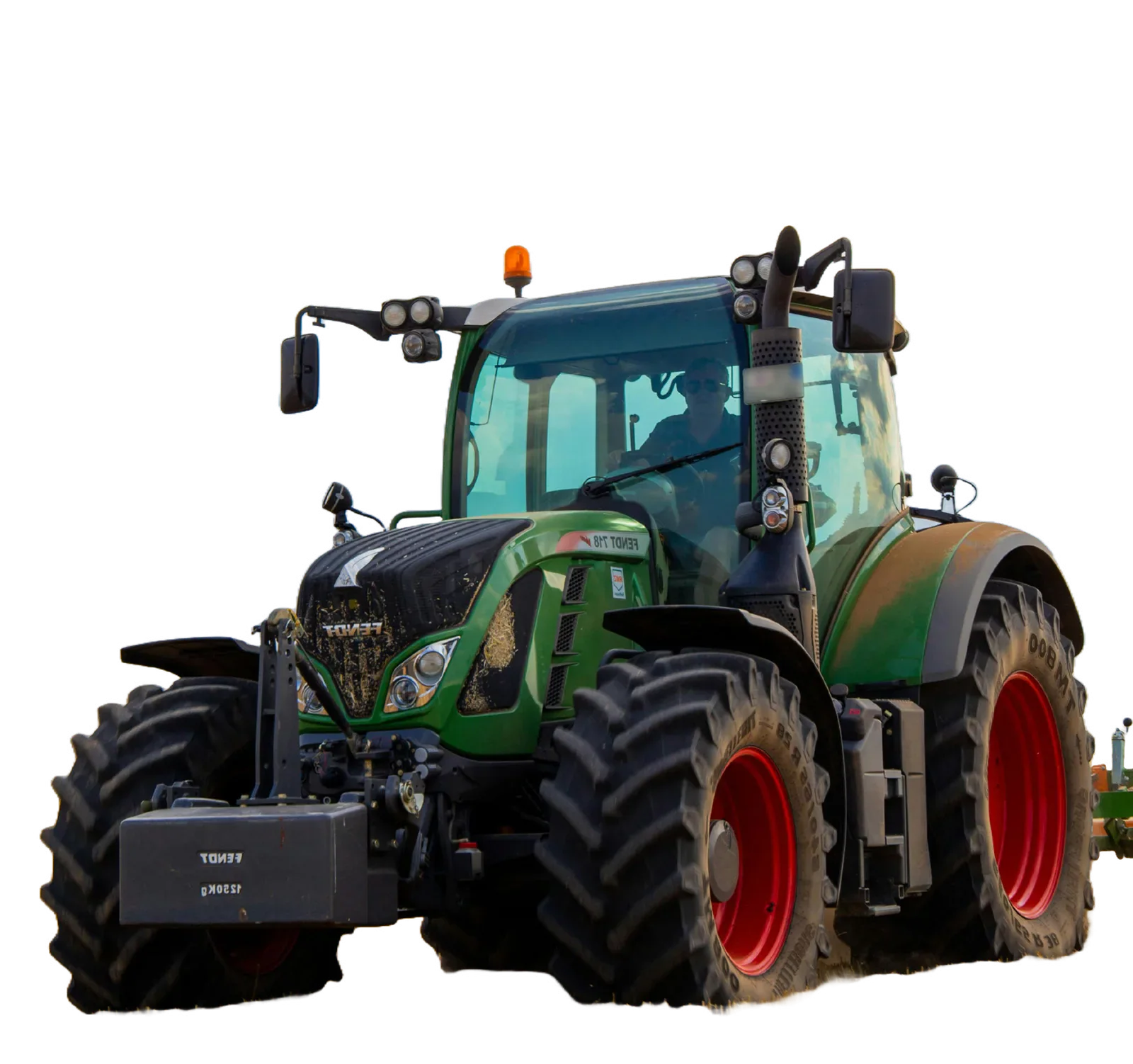 A green tractor illustrating the report on inheritance tax for farmers.