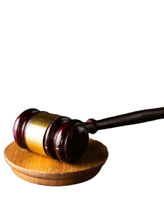 A wooden judge’s gavel and sounding block