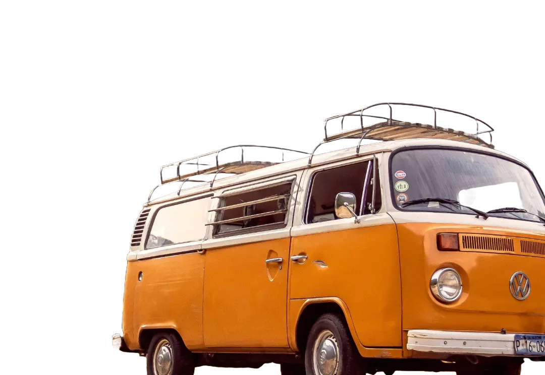 An orange and white Volkswagen camper van