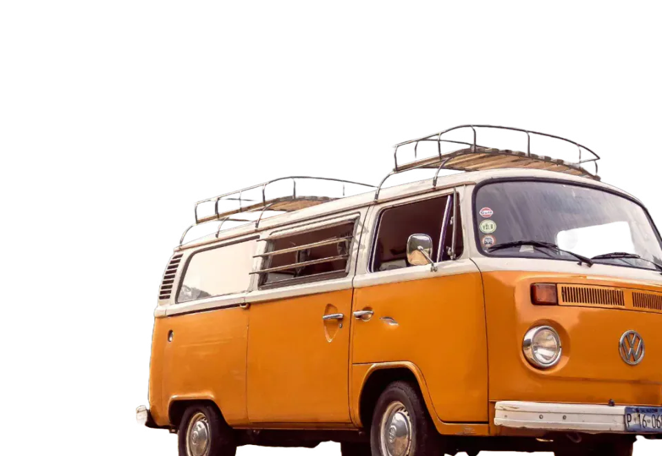An orange and white Volkswagen camper van