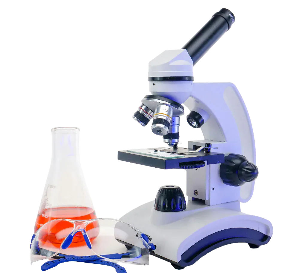 A microscope beside a flask of orange liquid and safety goggles.