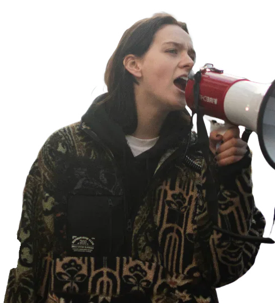 Alice Nicholson speaking through a megaphone.