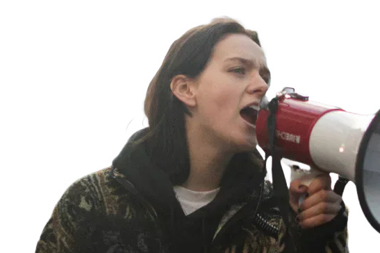 Alice Nicholson speaking through a megaphone.