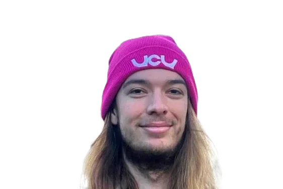 Aris Prevost wearing a pink UCU hat and a checked jacket.