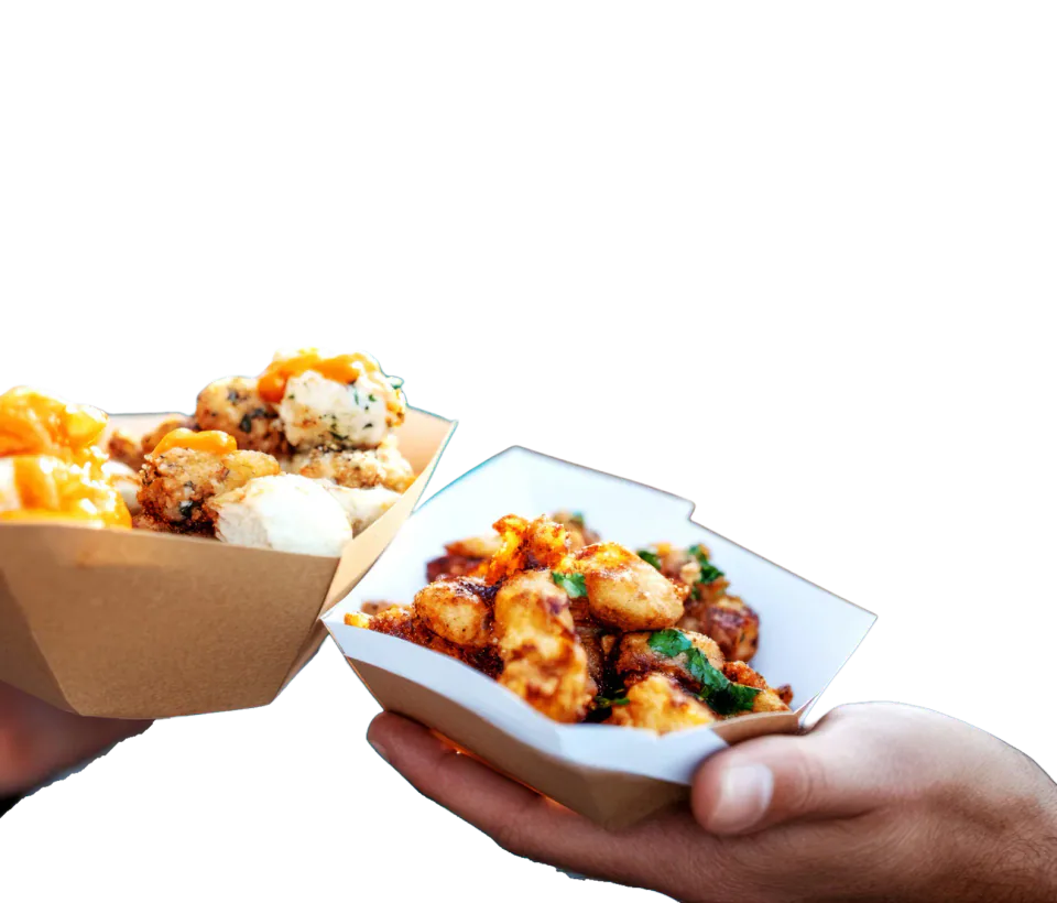 Street food in takeaway trays