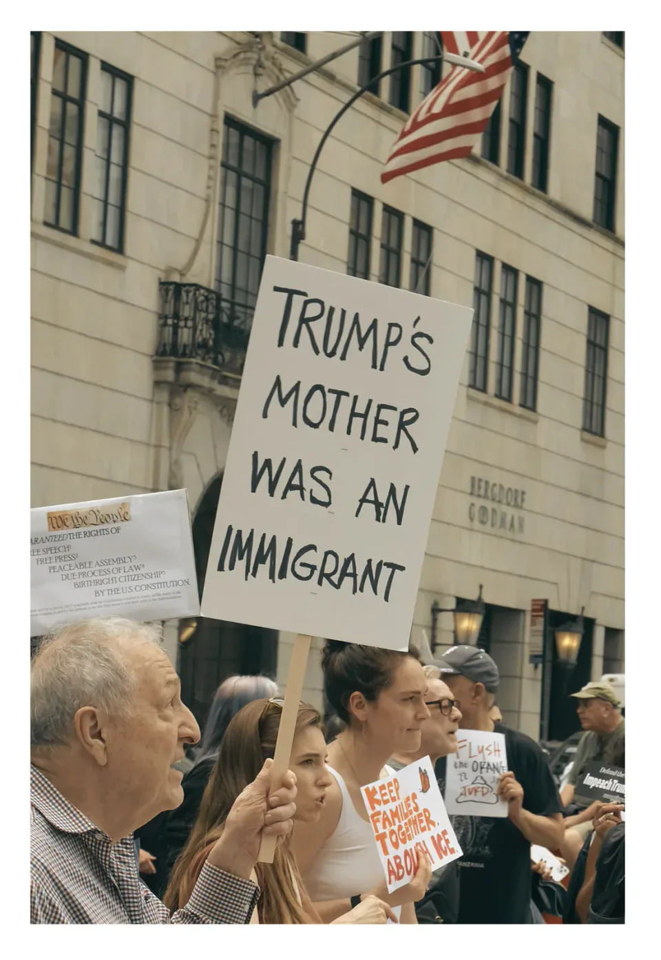 Anti-Trump protesters in Manhattan holding signs