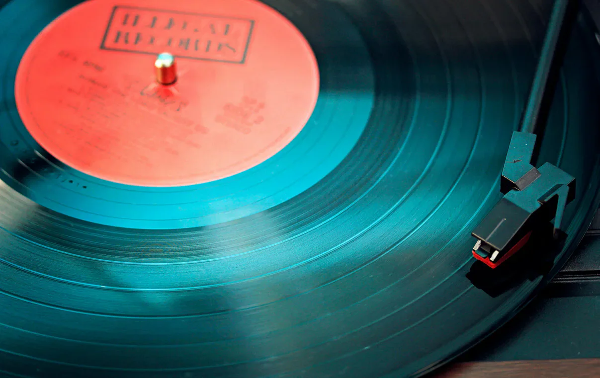 Vinyl record playing on a turntable