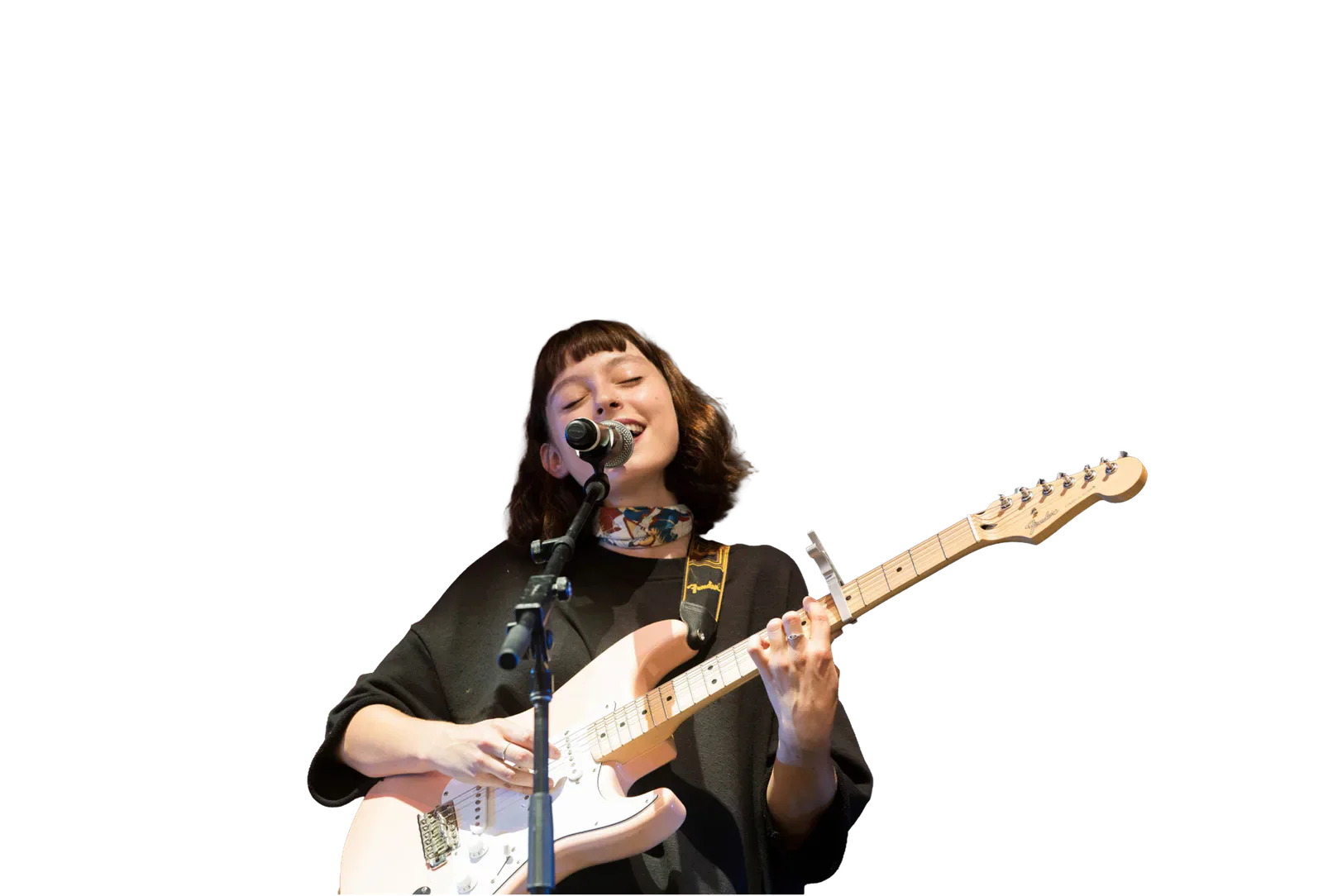 Stella Donnelly singing and playing guitar