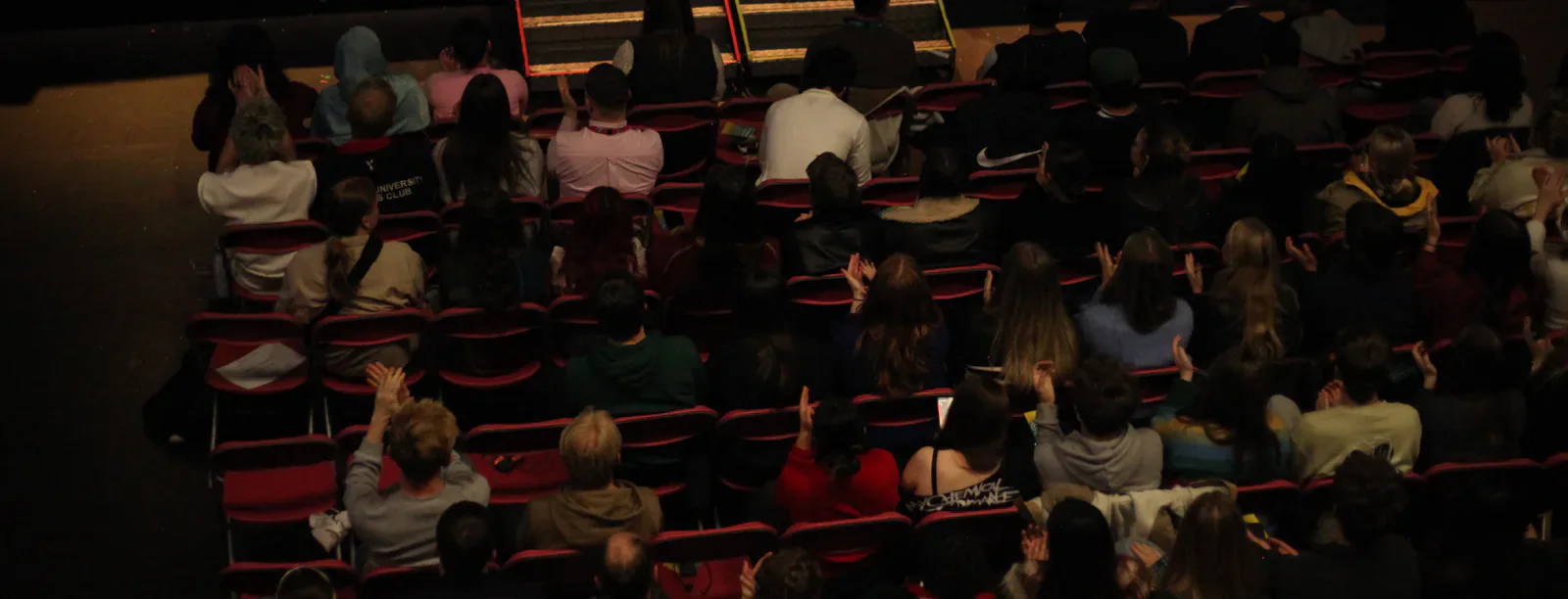 Students vote from the audience at the Cardiff Students’ Union AGM