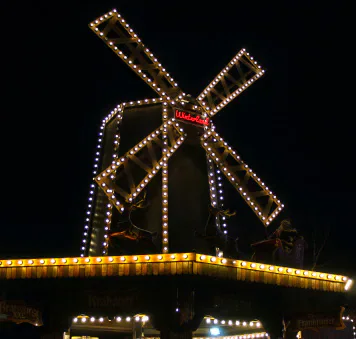 Illuminated windmill at a Christmas market