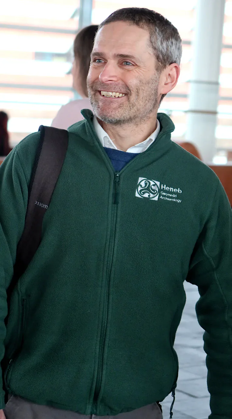 Heneb staff member wearing a green Heneb fleece.