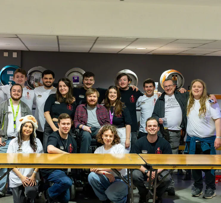 Students enjoying drinks at the Real Ale Festival.