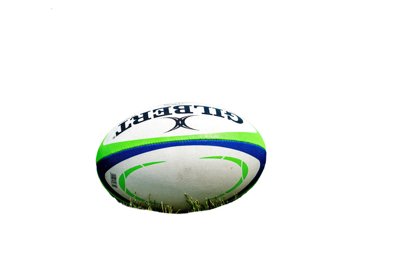 Gilbert rugby ball on grass.