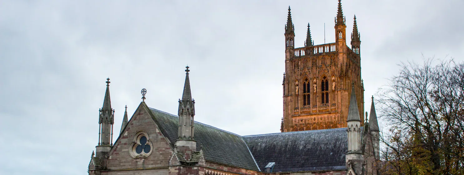 Worcester Cathedral beneath a cloudy sky