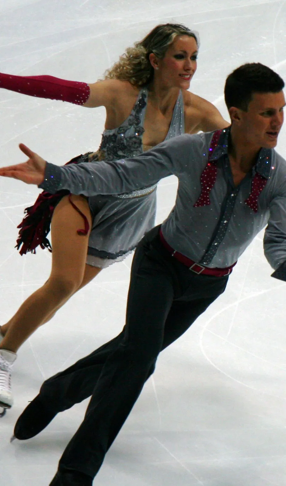 An ice-dancing pair performing on the rink