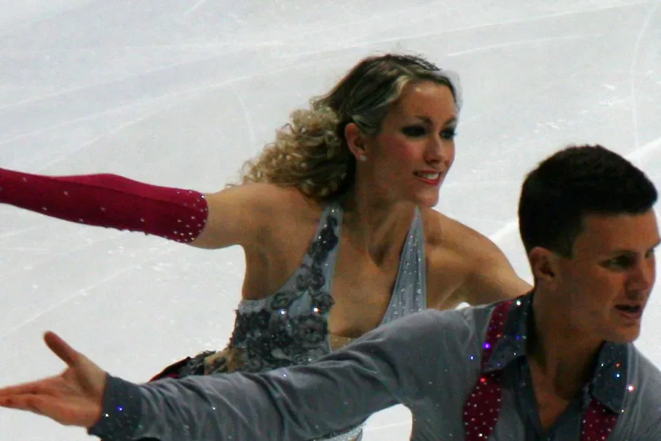 An ice-dancing pair performing on the rink