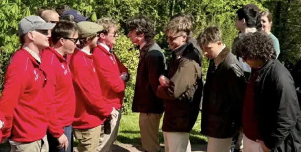 Cardiff and Swansea competitors stand together at the shooting ground.