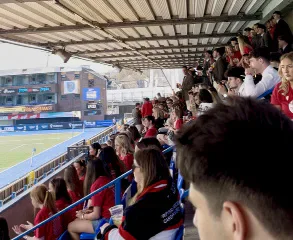 Supporters watch the rugby from the Arms Park stands.