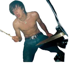 A shirtless MORN drummer performing.