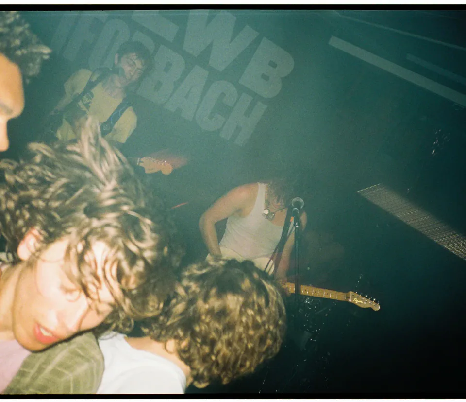 MORN performing to a tightly packed crowd at a live show.