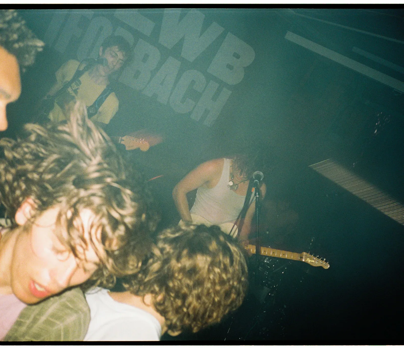 MORN performing to a tightly packed crowd at a live show.