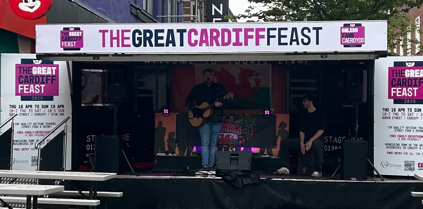 A musician performing on the Great Cardiff Feast stage.