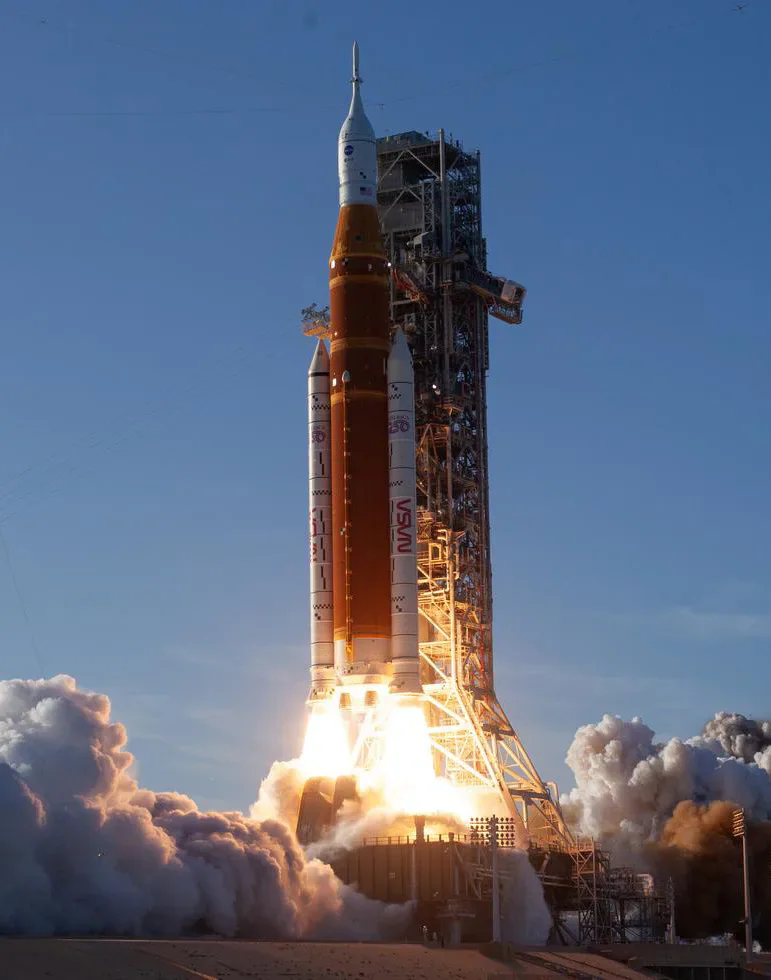 NASA’s Space Launch System rocket lifting off from its launch pad.