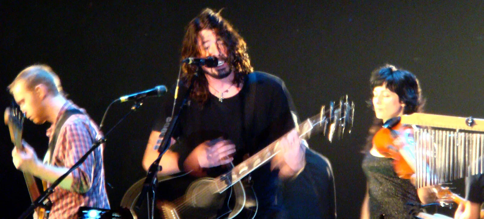 Foo Fighters performing on stage.