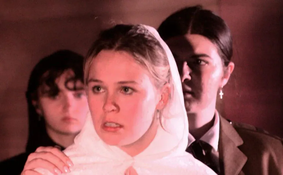Act One performers in a staged scene from Measure for Measure.