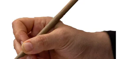 A hand writing with a pencil.