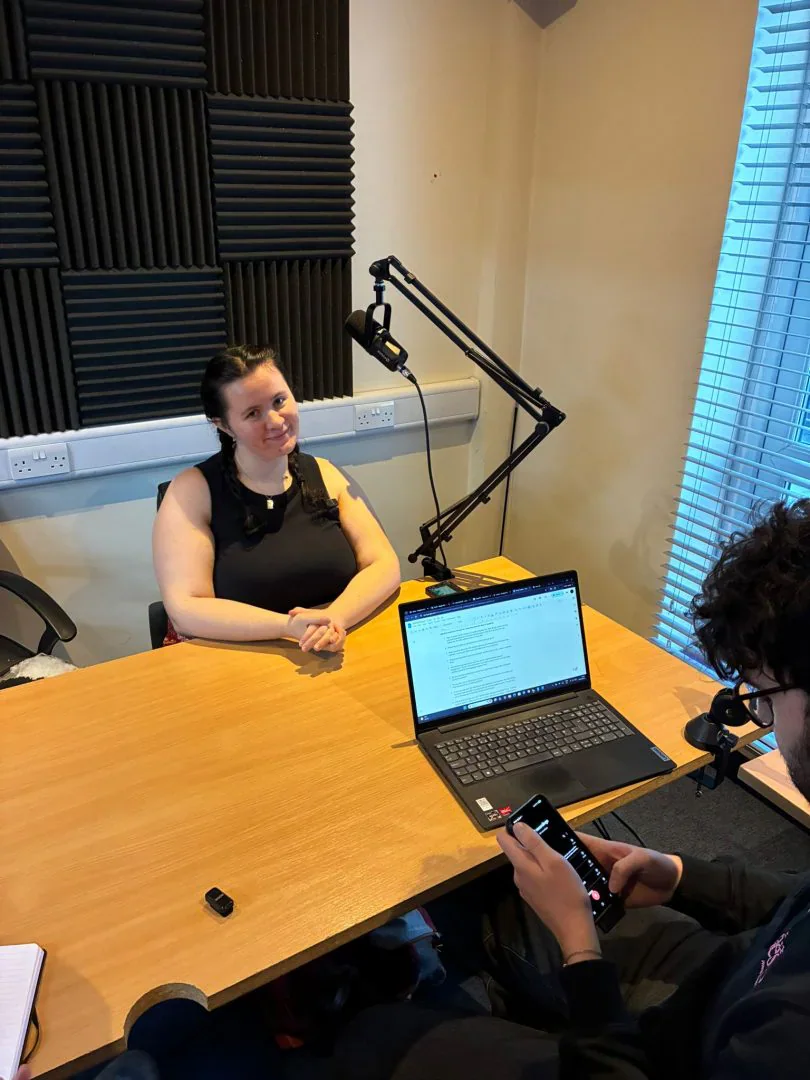 Maria Pollard, president of CUSU, is interviewed by two GR members.
