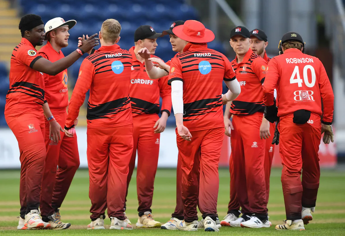 Cardiff men gather together during the Varsity cricket match.