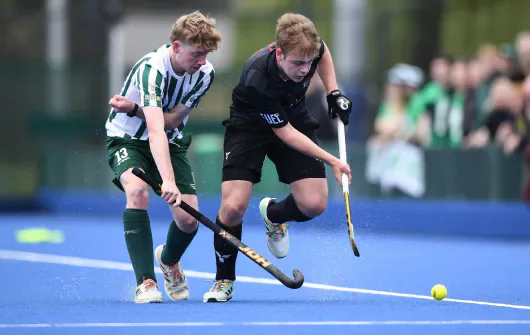 Cardiff and Swansea men contest the ball during the Varsity hockey match.